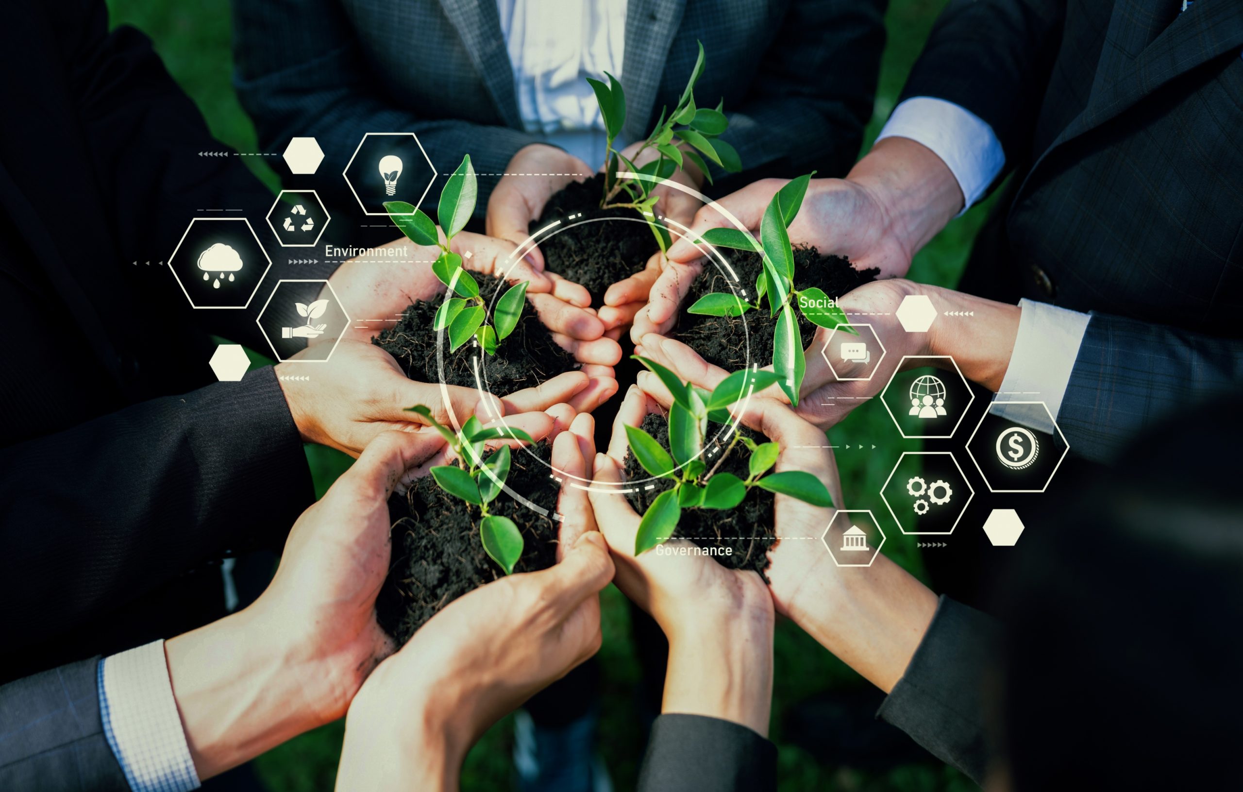 Business partnership leader nurturing a young seedling with ESG icons, symbolizing corporate unity, environmental protection, and sustainability.